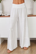 Women's wide leg tiered linen palazzo trousers, front view