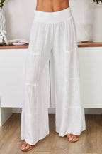Women's wide leg tiered linen palazzo trousers, front view