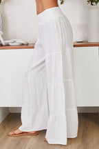 Women's wide leg tiered linen palazzo trousers, back view
