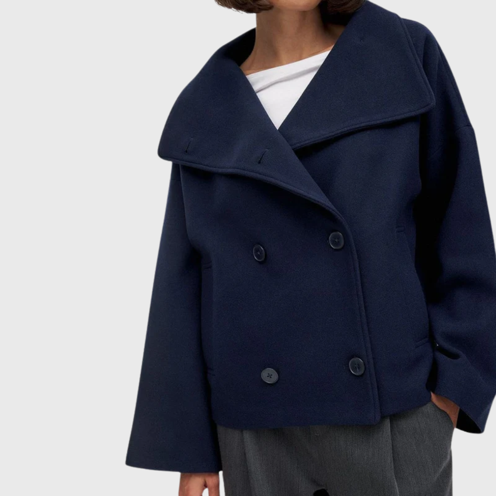 Cropped wide lapel double breasted textured coat with a wide lapel neckline