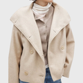 Cropped wide lapel double breasted textured coat with a double breasted front