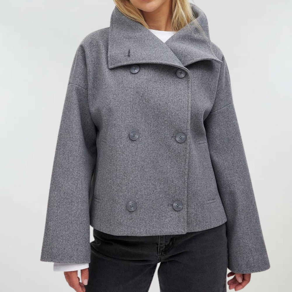 Cropped wide lapel double breasted textured coat with a textured surface