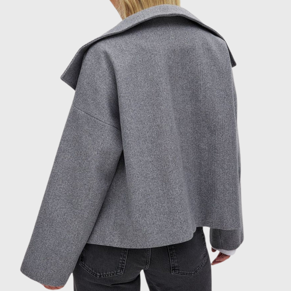 Cropped wide lapel double breasted textured coat with a wide lapel neckline
