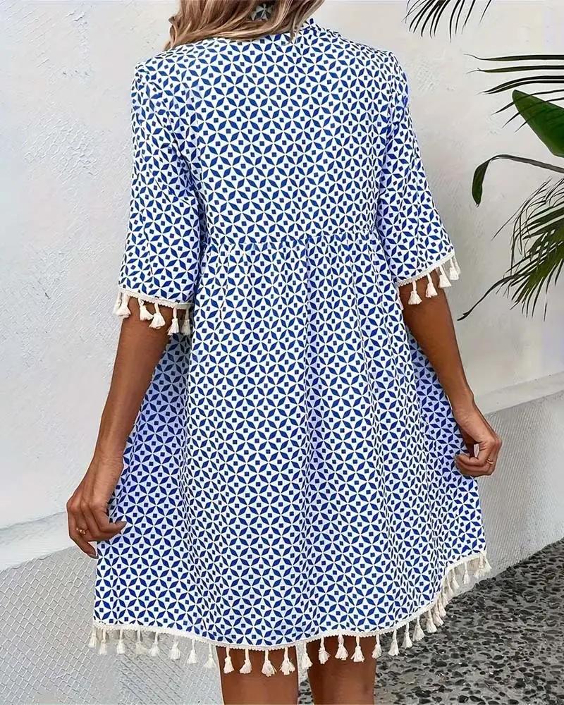 Tassel accent mini dress detail close-up