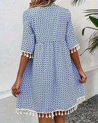 Tassel accent mini dress detail close-up