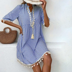 Women's printed mini dress with tassel accents