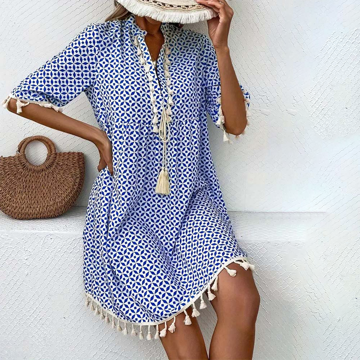Women's printed mini dress with tassel accents