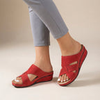Suede slip-on wedge sandals with artistic cutout straps – front view