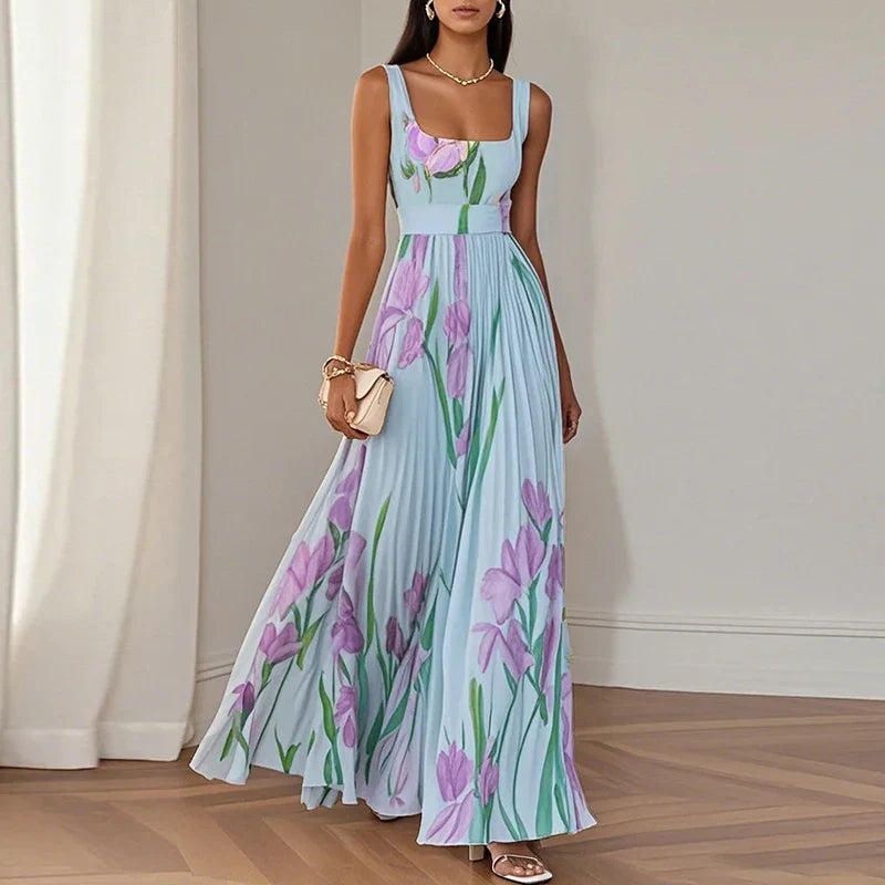 Women's floral square neck sleeveless pleated maxi dress showing flowing A-line silhouette, back view
