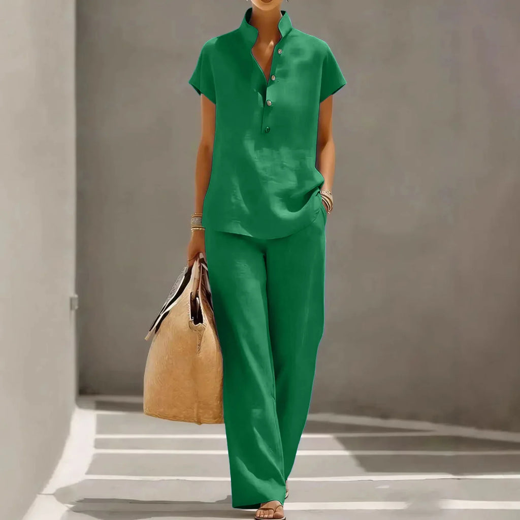 Women's linen co-ord set in dark blue, styled outdoor