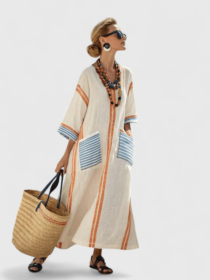 Women's boho striped kaftan maxi dress, movement shot showing flowing silhouette