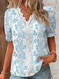 Women's lace V-neck printed blouse in light blue, front view