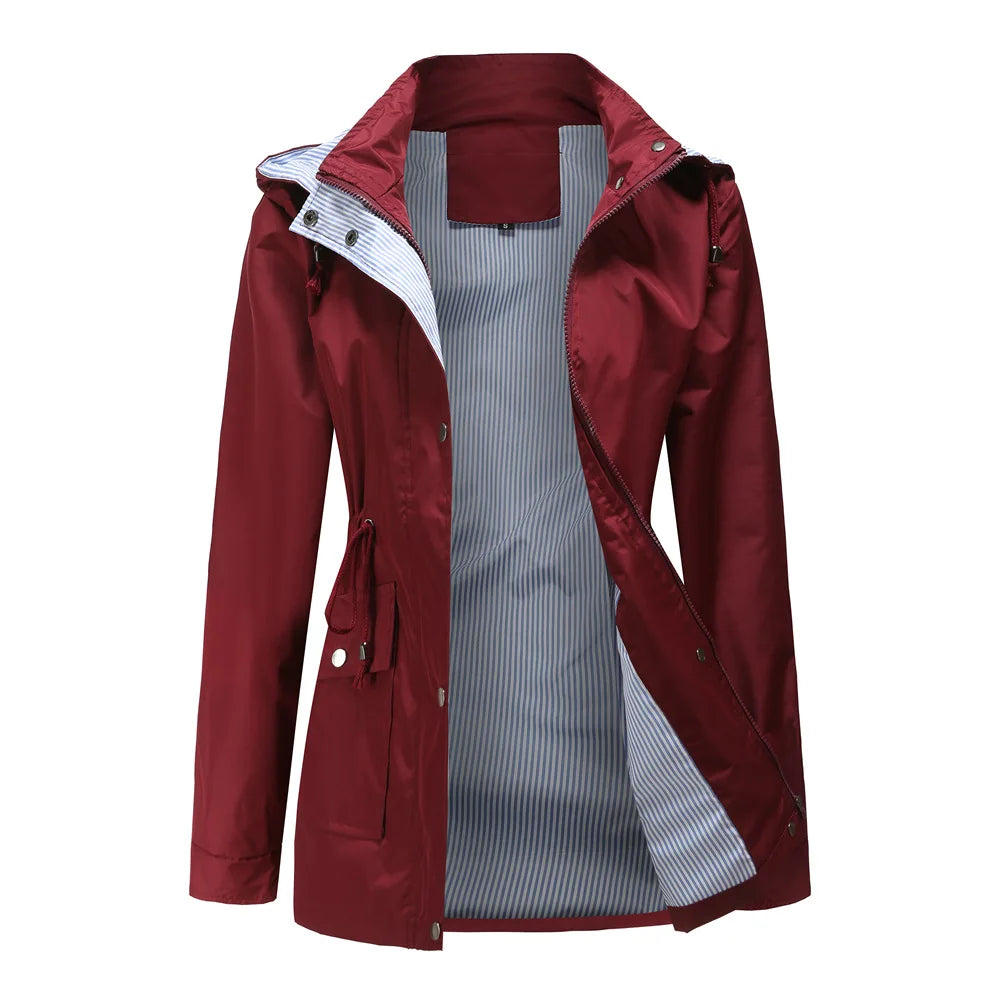 Water resistant detachable hood trench coat with a water resistant shell