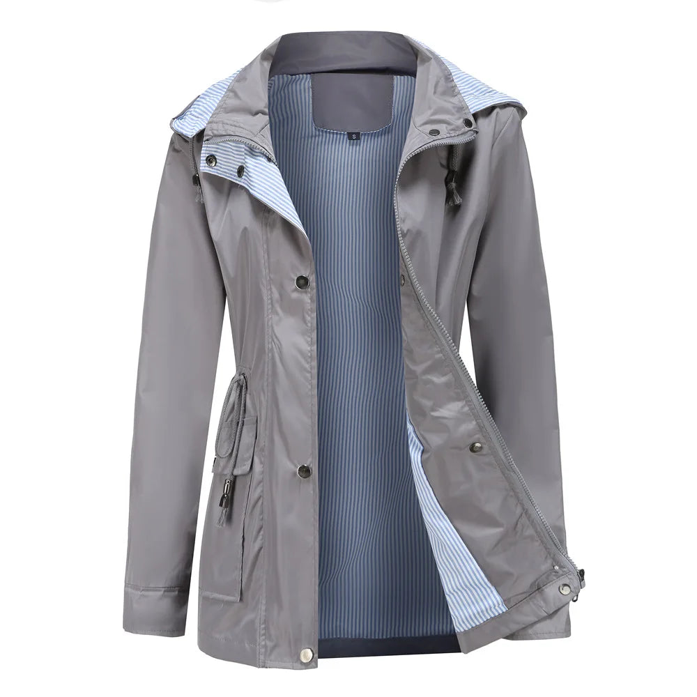 Water resistant detachable hood trench coat with a water resistant shell