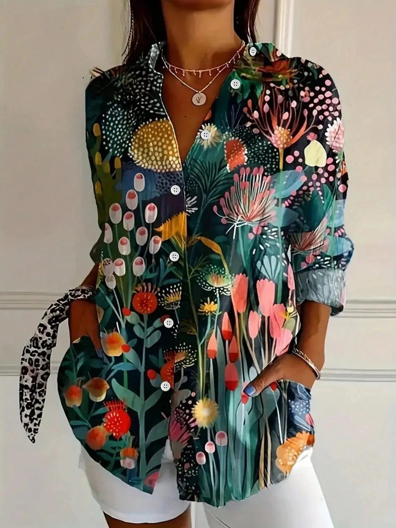 Abstract print relaxed blouse in green, front view