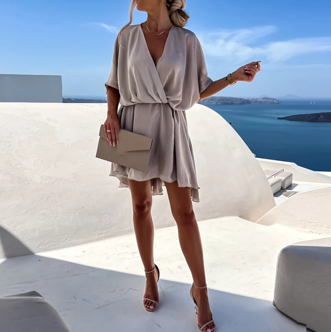 Women's elegant summer mini dress with breathable fabric, side view