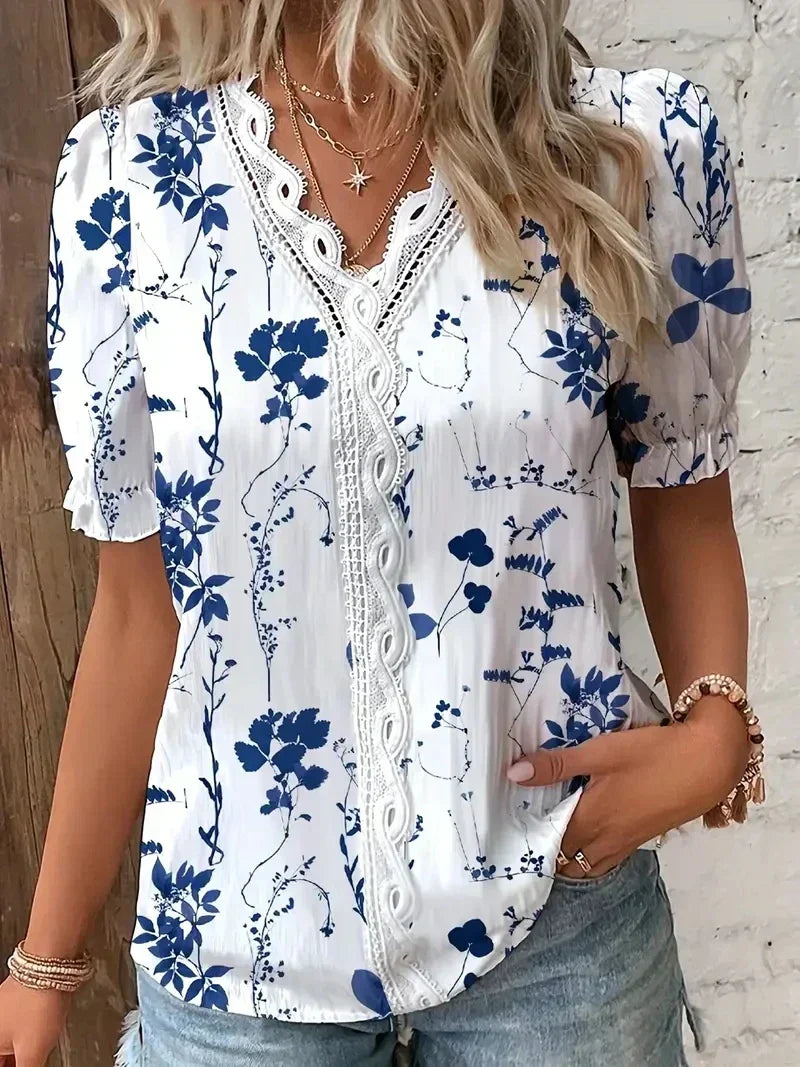 Women's printed blouse in dark blue, styled on model