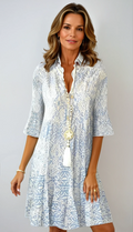Women's boho blue and white paisley floral mini dress with half-length flared sleeves, side view