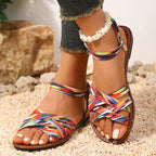 Women's vegan flat sandals with woven criss-cross straps, top view