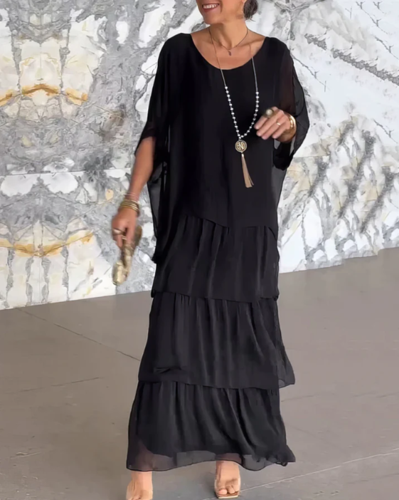 Black flowing occasion dress, classic and sophisticated | Alba Muse