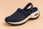 Ventilated clogs adjustable heel strap detail