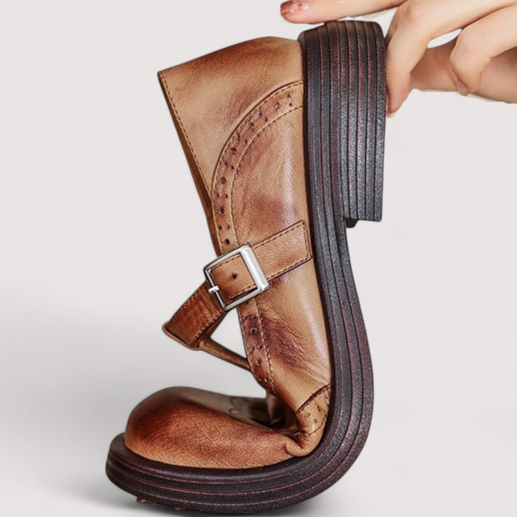 Brown leather Mary Jane shoes top-down view