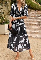 Black abstract print puff sleeve V-neck midi dress – front view