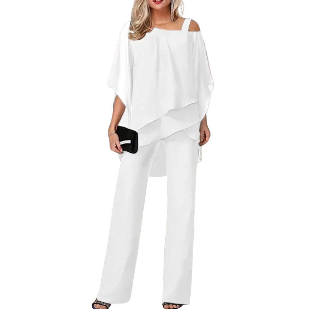 Chiffon batwing co-ord suit showing layered overcoat drape and movement