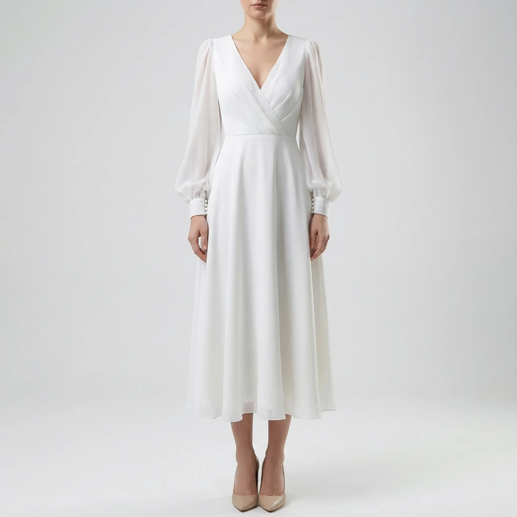 Women's classic long sleeve flowing wedding dress, back view