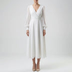 Women's classic long sleeve flowing wedding dress, back view