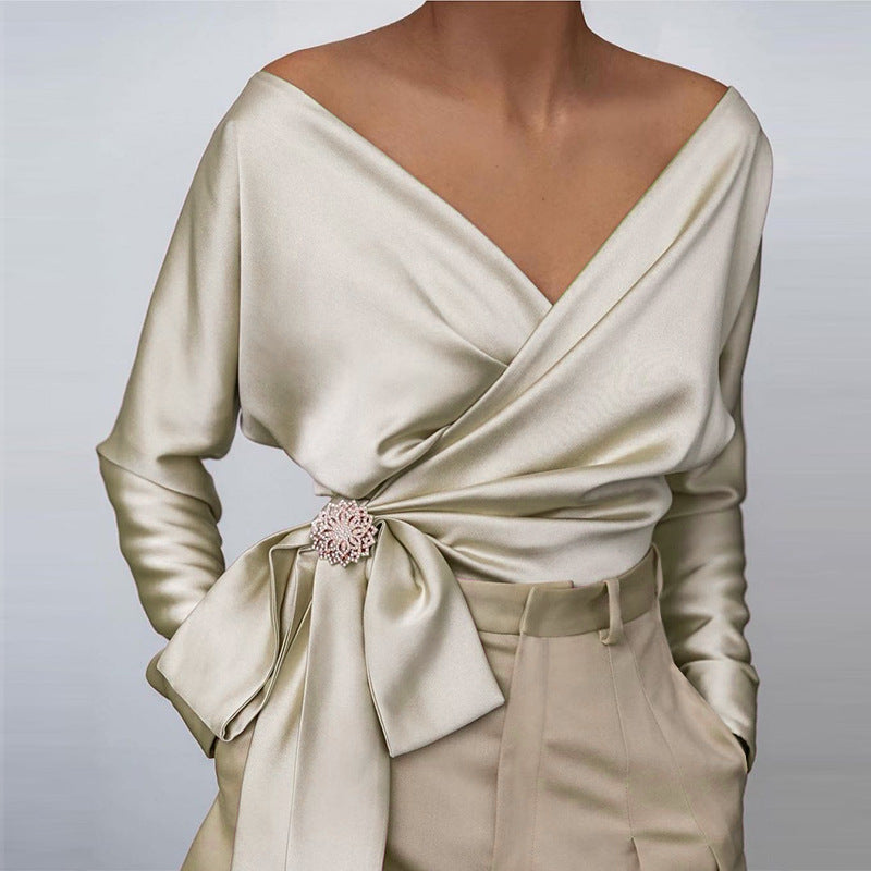 Women's wrap blouse bow brooch detail | Alba Muse