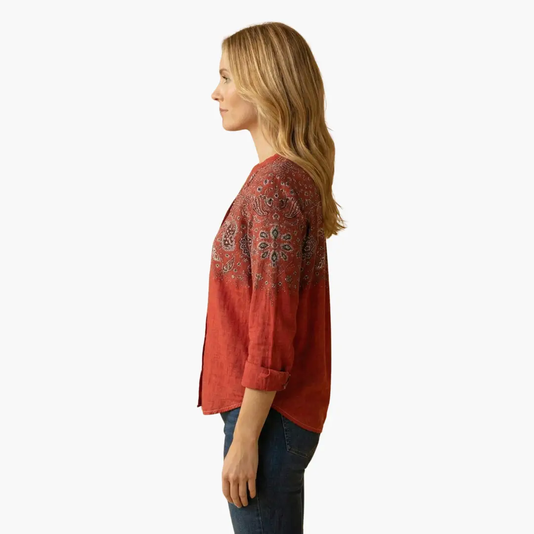 Women's smart casual long sleeve shirt styled with trousers, three-quarter view