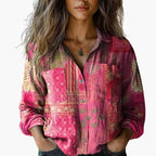 Women's long sleeve button-down blouse styled with skirt, side view