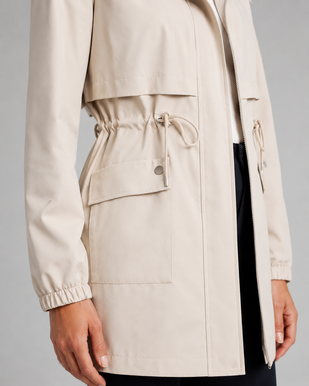 Beige hooded windbreaker coat