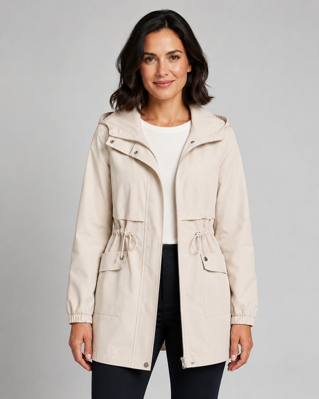 Beige hooded windbreaker coat, front view