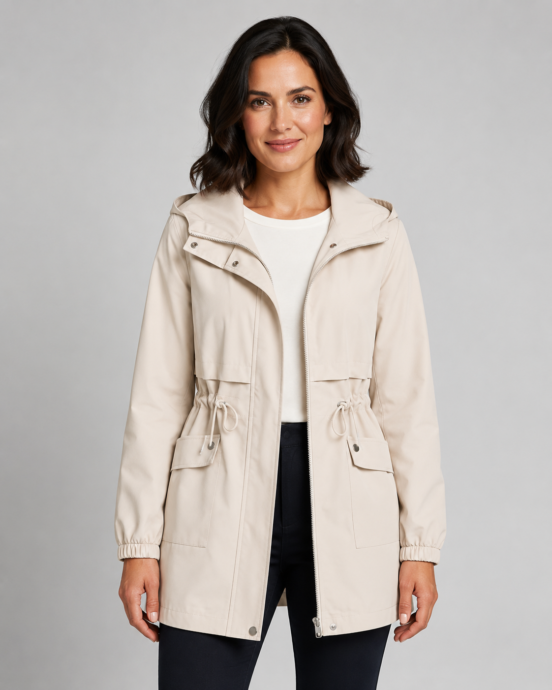 Beige hooded windbreaker coat, front view