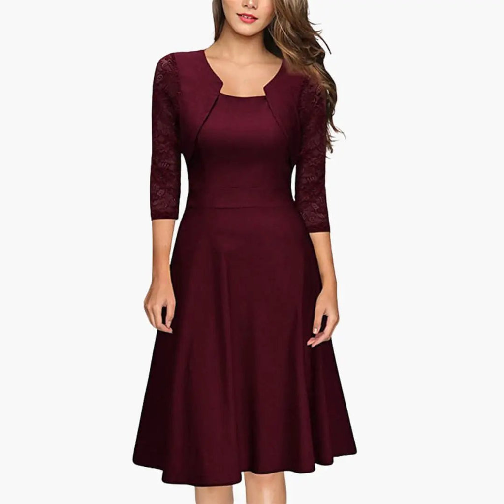Wedding guest midi dress with lace sleeves and flared skirt, movement shot