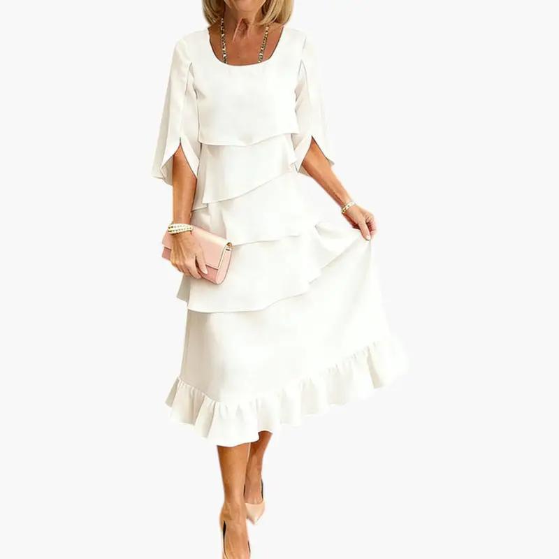Cotton ruffle split sleeve midi dress styled for a garden party