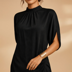 Close-up of split sleeve detail on women's mock neck mini dress