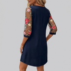 Women's floral embroidered mini dress back view