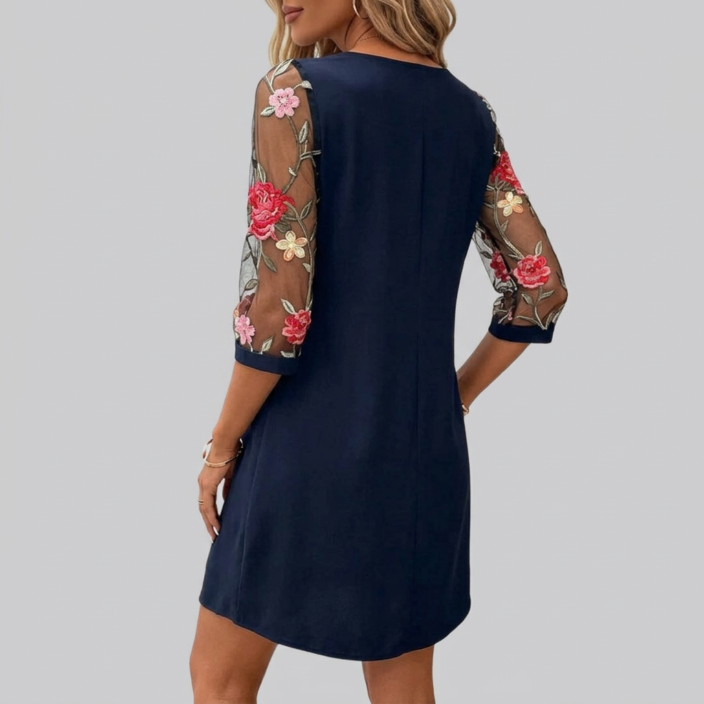 Women's floral embroidered mini dress back view