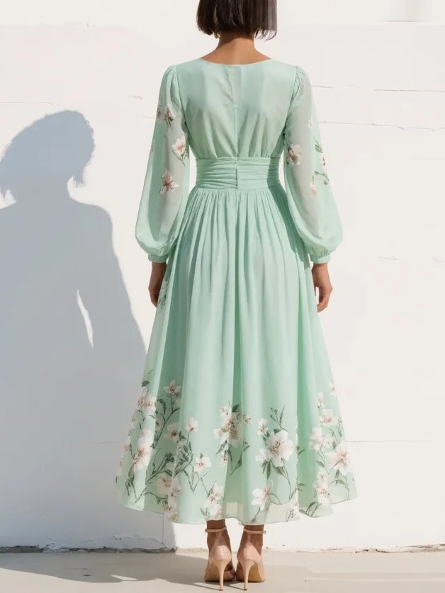 Women's floral midi dress in light green – back view long sleeve