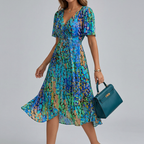 Floral midi dress with gathered bodice and drawstring waist, side view