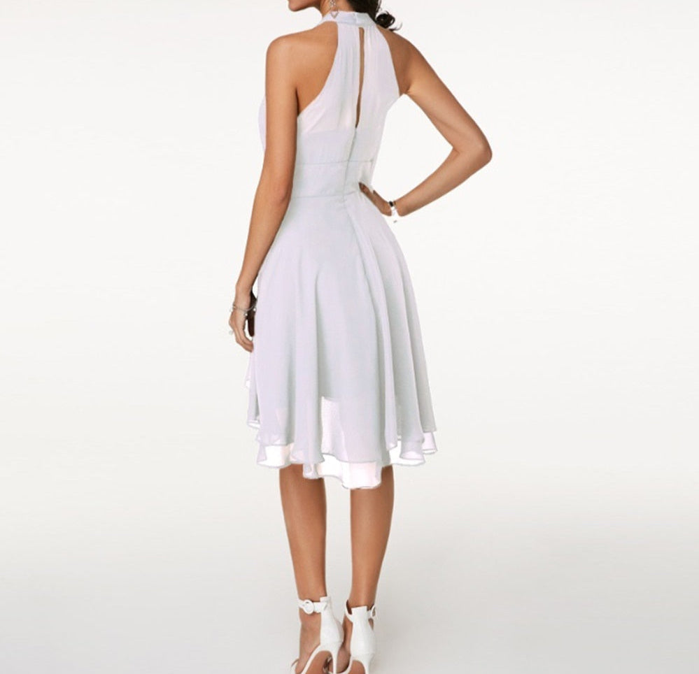 Halter neck party midi dress, skirt detail view