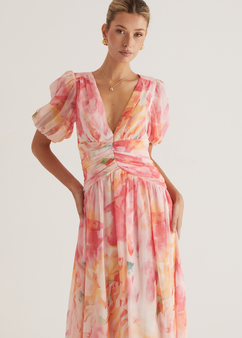Women's floral cotton maxi dress, side view showing flowing silhouette