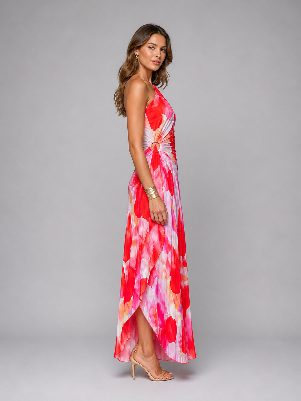 One-shoulder maxi dress side profile flowing pleats