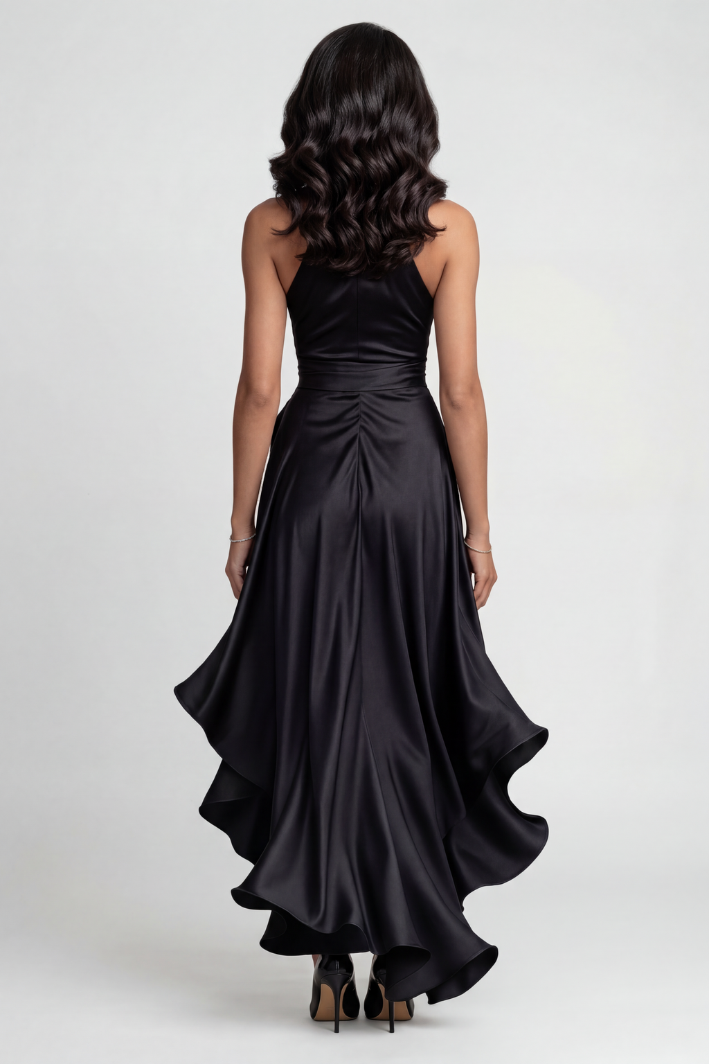 Halter prom dress with wrapped waist and tie detail, side view