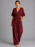 Waist cinch detail close-up white jumpsuit