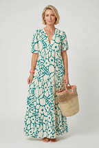 Women's V-neck printed midi dress styled for a casual summer occasion