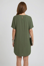 Women's V-neck summer mini dress with short split sleeves, side profile view